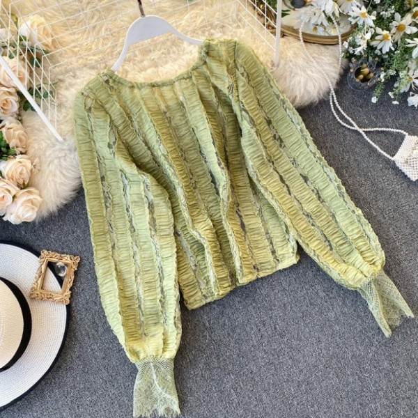 Modern női blúz ovális nyakkivágással és hosszú ujjú zöld, fehér és fekete színben