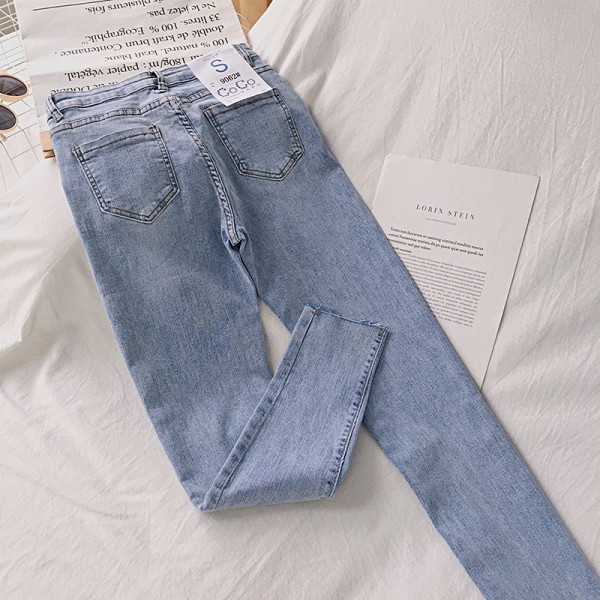 Alkalmi női farmer kék színben, gombokkal és magas derékkal