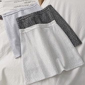 Női szoknya fehér, fekete és kék színben, magas derékkal és A-vonallal