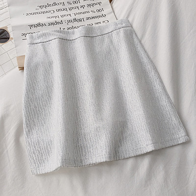 Női szoknya fehér, fekete és kék színben, magas derékkal és A-vonallal