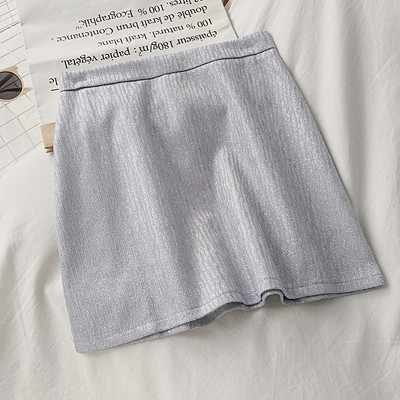 Női szoknya fehér, fekete és kék színben, magas derékkal és A-vonallal