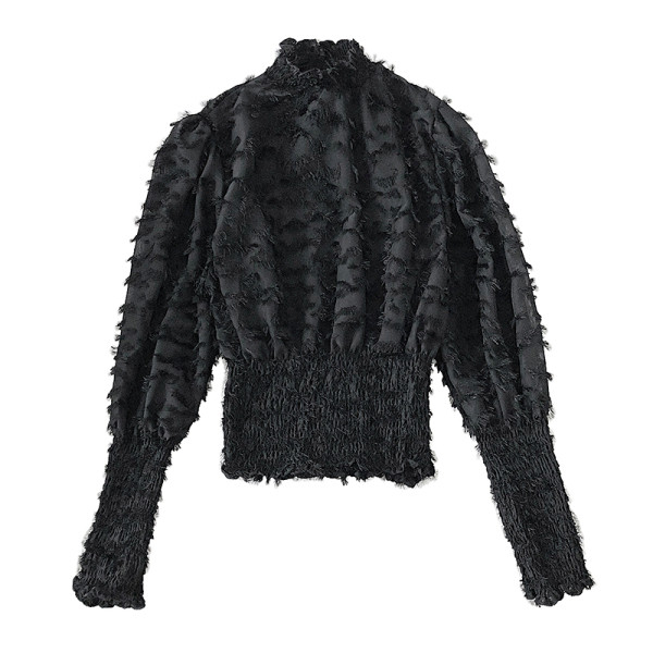 Bézs, fekete-fehér női blúz magas gallérral és bojttal