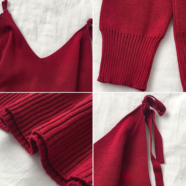 Női pulóver fekete, fehér és piros színű, V-nyakú