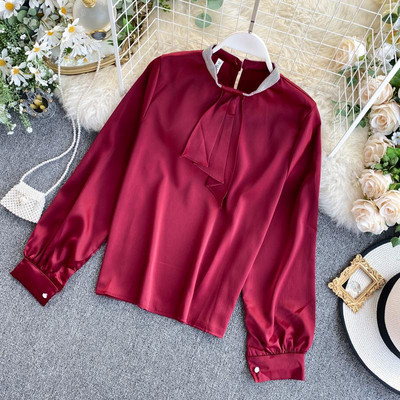 Modern női ing szalaggal és ovális nyakkivágással fehér, zöld, piros, rózsaszín és bézs színben