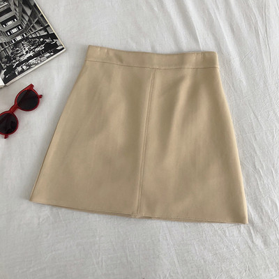 Női bőrszoknya fekete, bézs, zöld és sárga színekben, magas derékkal