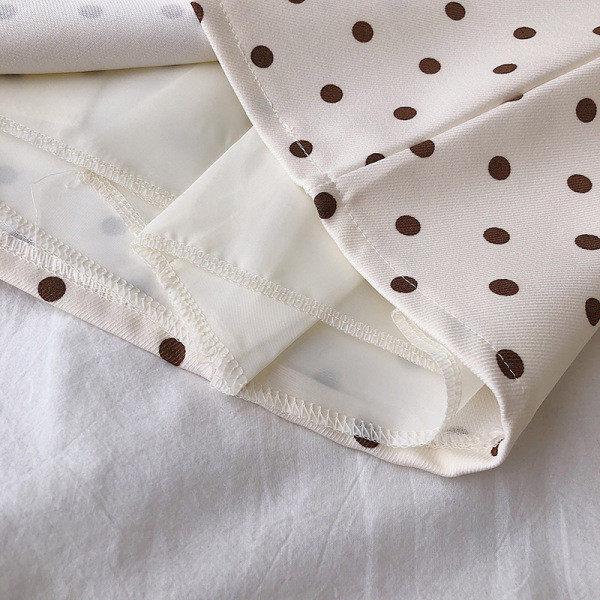 Fekete, zöld és fehér rövid női szoknya, magas derékkal