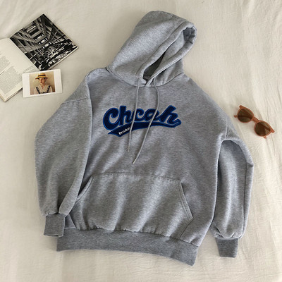 Zöld, sárga és szürke női pulóver hímzéssel és zsebbel