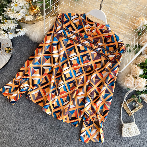 Retro stílusú női ing kék és narancs színben, széles ujjakkal és gombokkal