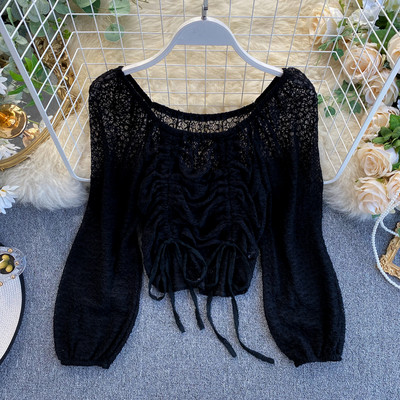 Női csipkeblúz bézs, fehér és fekete színű, megkötős