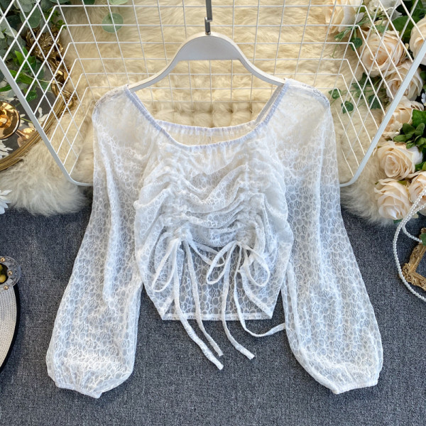 Női csipkeblúz bézs, fehér és fekete színű, megkötős