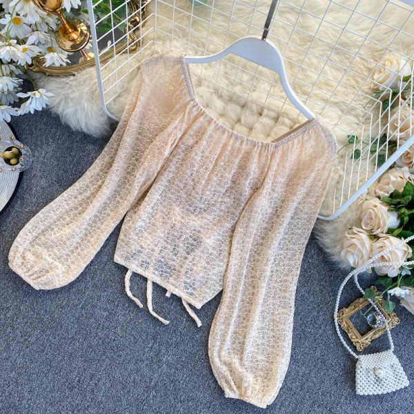 Női csipkeblúz bézs, fehér és fekete színű, megkötős