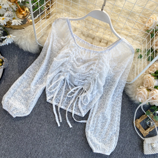 Női csipkeblúz bézs, fehér és fekete színű, megkötős