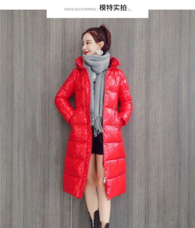 Női téli kabát hosszú modell kapucnival piros, zöld, fehér és fekete színben