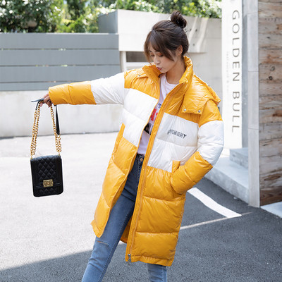 Modern női kabát hosszú modell kapucnival fekete, sárga és fehér színekben