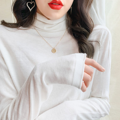 Modern női blúz vékony kötésből, magas gallérral és hosszú ujjú, különböző színekben