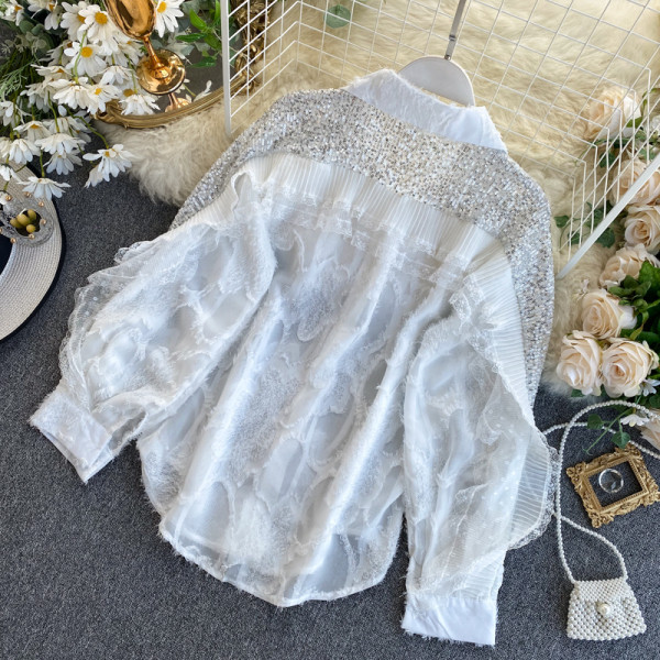 Modern női ing fehér és fekete színben, klasszikus gallérral és flitterekkel