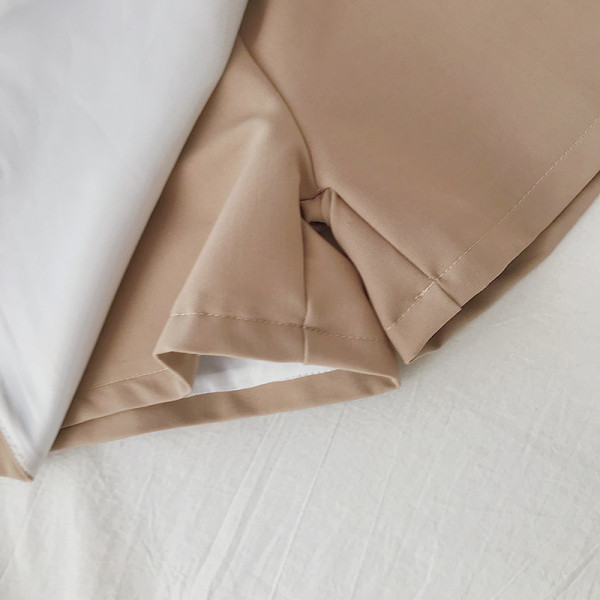 Modern női szoknya-nadrág fekete, bézs és barna színben, magas derékkal