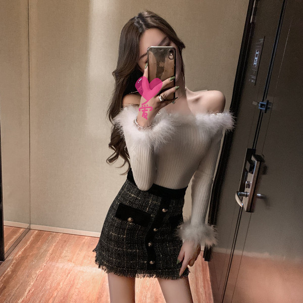 Női blúz pehely és csupasz vállú fekete színben