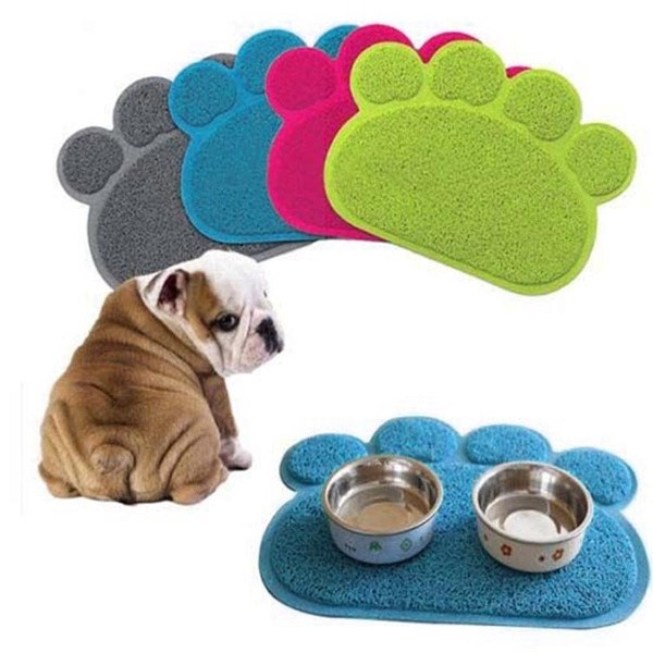 Non-slip mat for placing pet bowls in the shape of a paw in blue, pink, green, gray and red