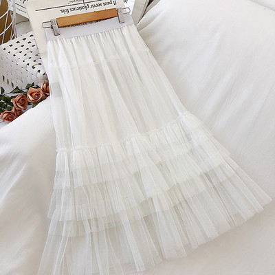 Női szoknya fekete, bézs és fehér színben gumírozott derékkal és tüllel