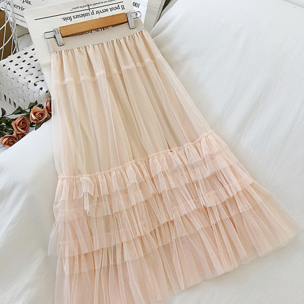 Női szoknya fekete, bézs és fehér színben gumírozott derékkal és tüllel