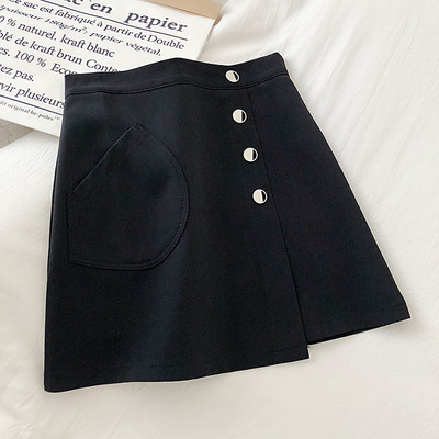 Μικρή γυναικεία φούστα σε μαύρο και μπεζ χρώμα με ψηλή μέση και κουμπιά