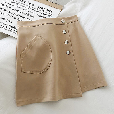 Μικρή γυναικεία φούστα σε μαύρο και μπεζ χρώμα με ψηλή μέση και κουμπιά