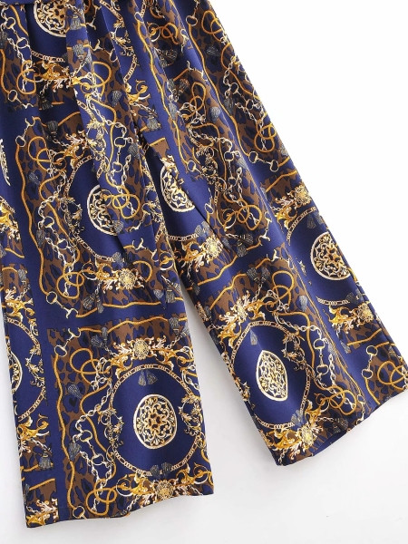 Divatos női ujjatlan kombiné derékkötővel, kék színben, mintás mintával