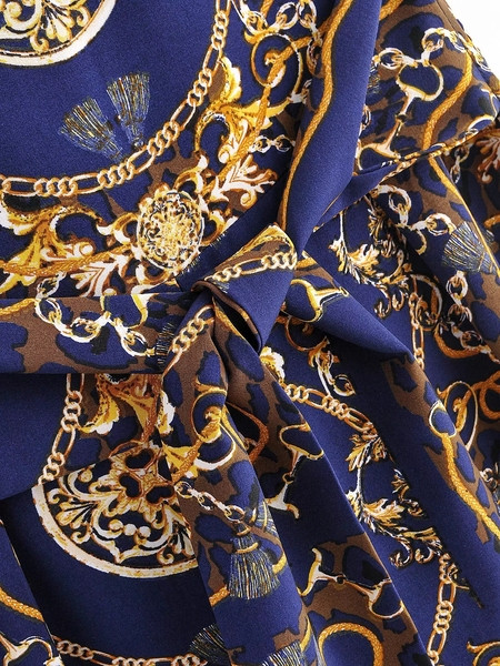 Divatos női ujjatlan kombiné derékkötővel, kék színben, mintás mintával