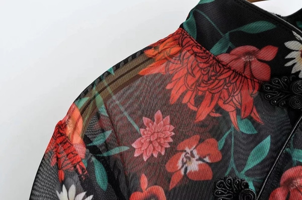 Bluză scurtă transparentă cu guler polo și mâneci scurte cu model negru și floral