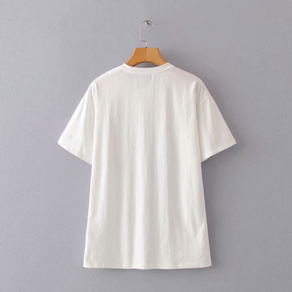 Alkalmi női rövid ujjú póló fehér színben, rátéttel