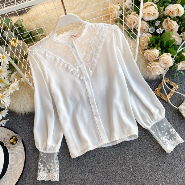 Stiilne valge ja musta värvi pitsi ja nööpidega naiste särk