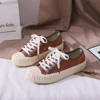 Modern női textil tornacipő fűzős, lapos talppal