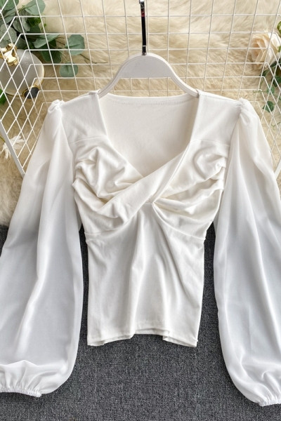 Κομψή γυναικεία μπλούζα με φαρδιά μανίκια και V-neck