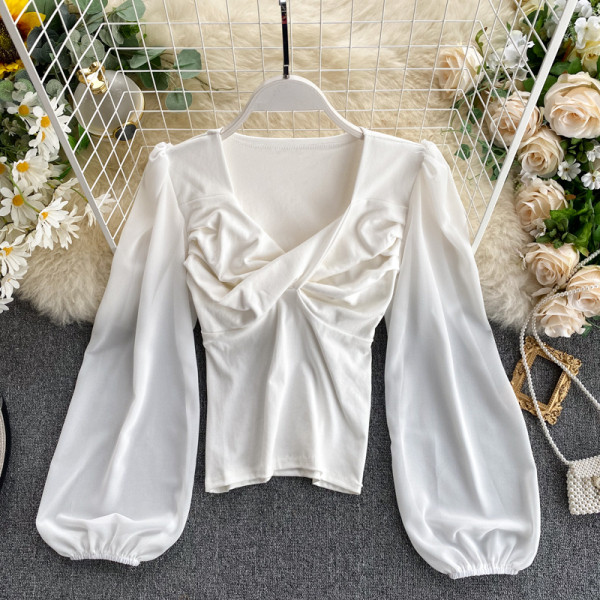 Κομψή γυναικεία μπλούζα με φαρδιά μανίκια και V-neck