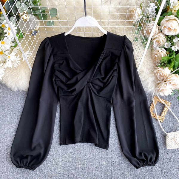 Κομψή γυναικεία μπλούζα με φαρδιά μανίκια και V-neck