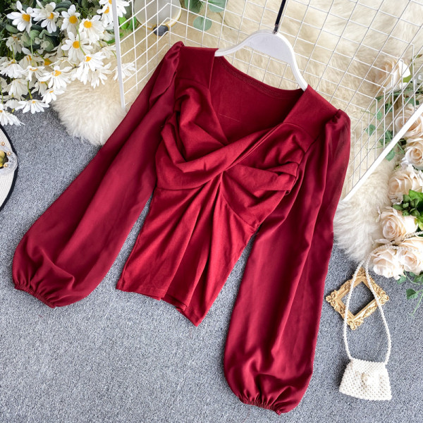 Κομψή γυναικεία μπλούζα με φαρδιά μανίκια και V-neck