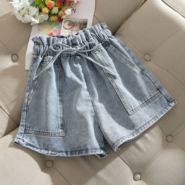 Kõrge vöökoha ja lipsudega vabaaja naiste lühikesed püksid – lai mudel