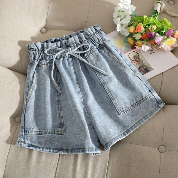 Kõrge vöökoha ja lipsudega vabaaja naiste lühikesed püksid – lai mudel