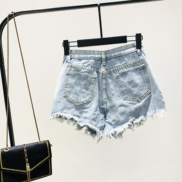 Нов модел къси дамски панталони с пулове и скъсани мотиви