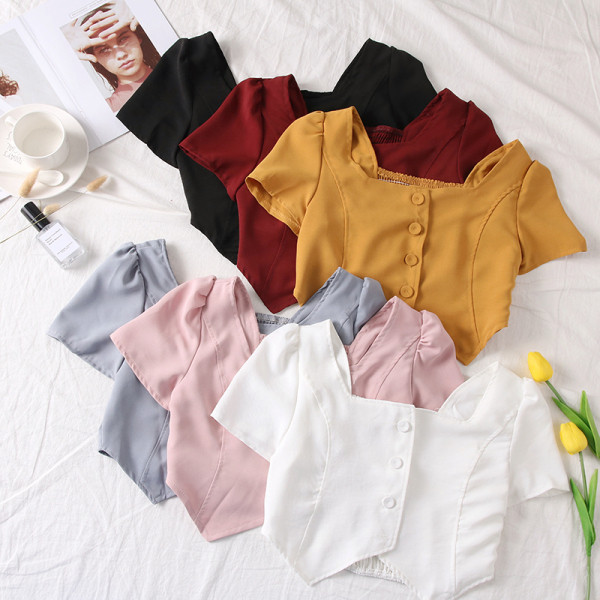 Moodne naiste topp kandilise dekoltee ja nööpidega