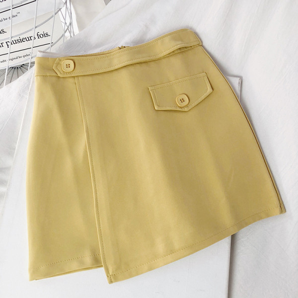 Női aszimmetrikus szoknya magas derékkal és gombokkal