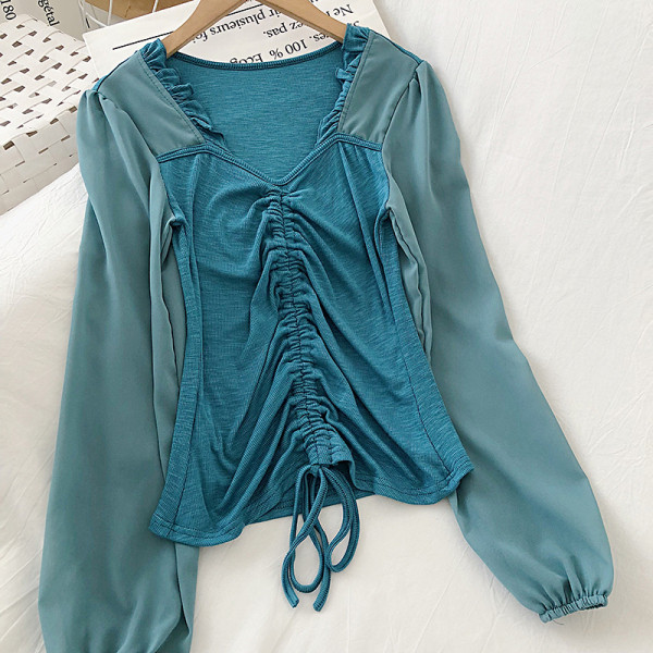 Modern női blúz V-nyakú és fűzős