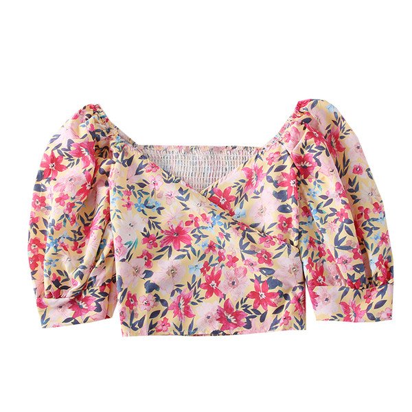 Modern női blúz virágos motívumokkal, spitz nyakkivágással és rövid ujjú