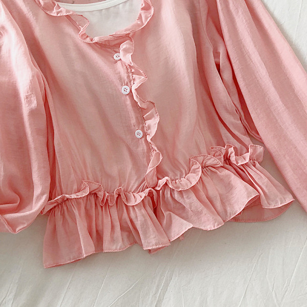 Μοντέρνα γυναικέια μπλούζα με μακριά μανίκια και κουμπιά