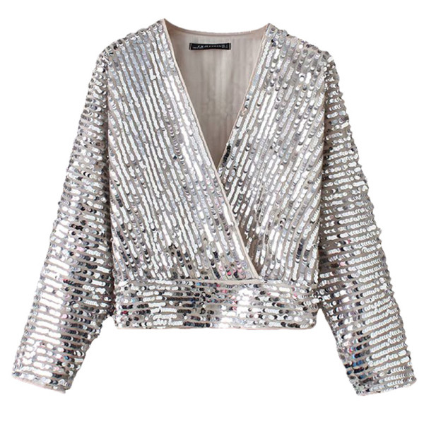 Modern női blúz mély V-nyakkal és flitterekkel