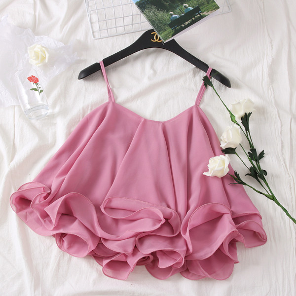 Modern, kivágott női felső vékony pántokkal és spitz nyakkivágással