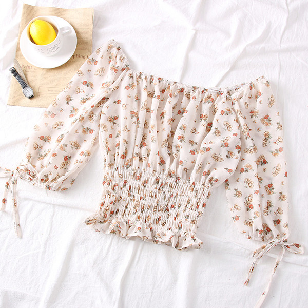 Modern női blúz virágmintás és csónakos nyakkivágással