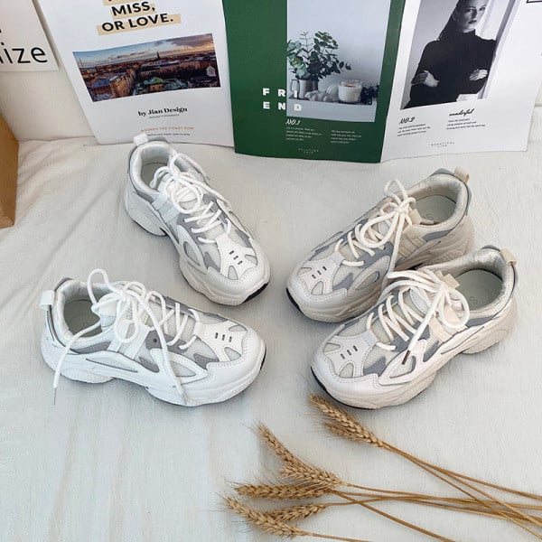 Öko bőrből készült modern női tornacipő fényvisszaverő elemekkel, durva talppal