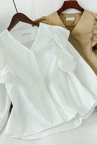 Új modell női ing fürtökkel és V-nyakkal